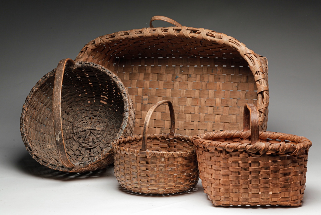 Appraisal: FOUR AMERICAN GATHERING BASKETS Early th century Woven splint with