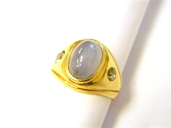 Appraisal: JEWELRY Star Sapphire and Diamond Ring K yellow gold oval