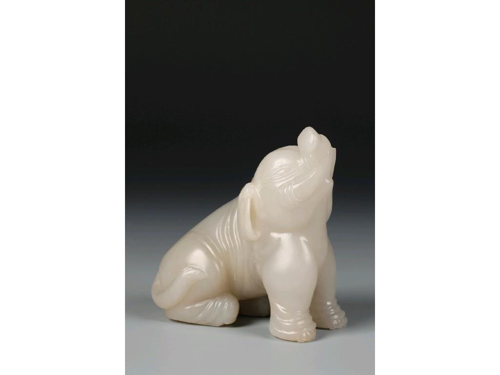 Appraisal: A CHINESE WHITE JADE ELEPHANT with the beast seated and