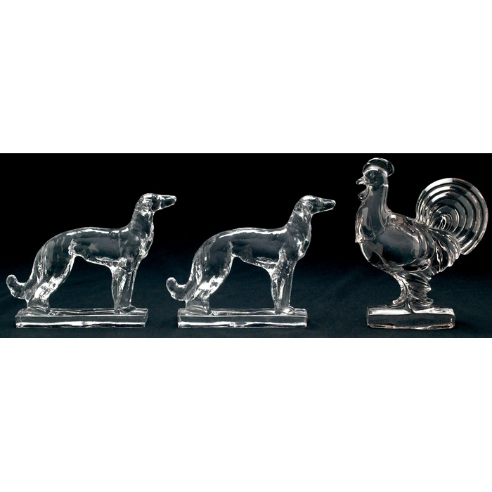 Appraisal: New Martinsville bookends dog figurines in clear glass w x