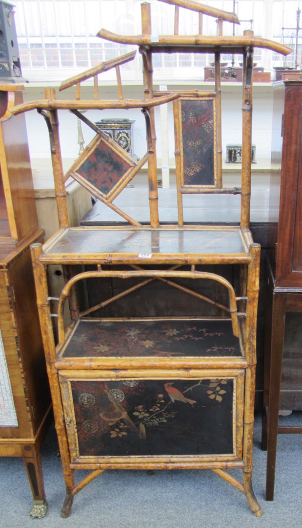 Appraisal: A th century bamboo and chinoiserie decorated side cabinet with