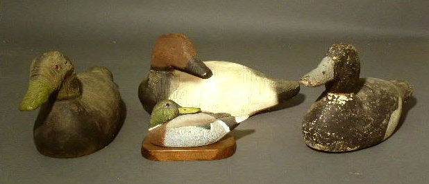 Appraisal: Three duck decoys and a carved duck