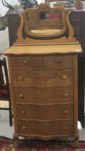 Appraisal: LATE VICTORIAN OAK DRESSER WITH MIRROR American c the serpentine-shaped