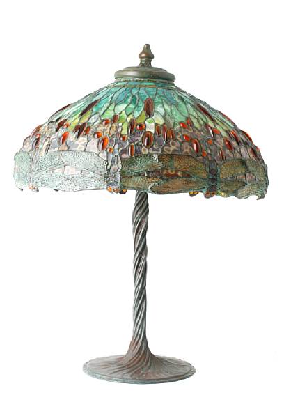 Appraisal: A Tiffany style reproduction leaded glass and patinated-metal Dragonfly lamp