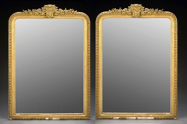 Appraisal: A pair of Napoleon III carved giltwood and gesso mirrors