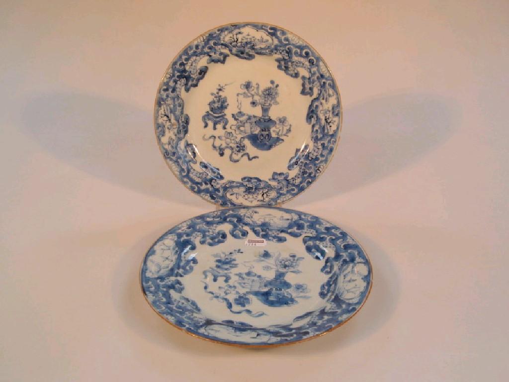 Appraisal: A pair of Chinese export blue and white plates painted