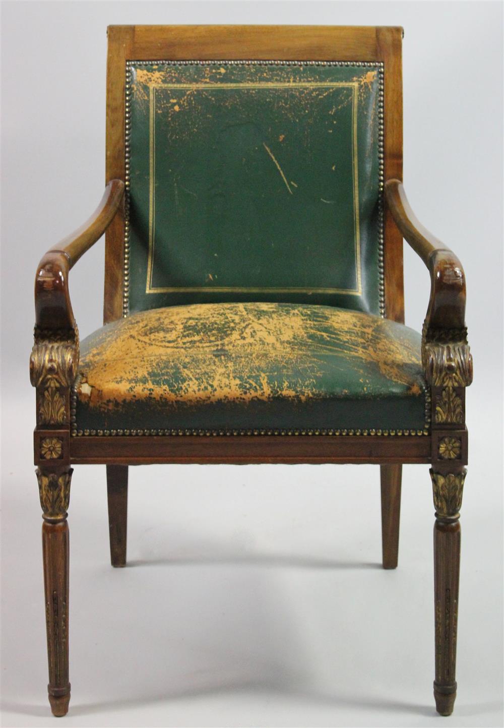 Appraisal: REGENCY STYLE MAHOGANY AND GILT GREEN LEATHER OPEN ARMCHAIR having