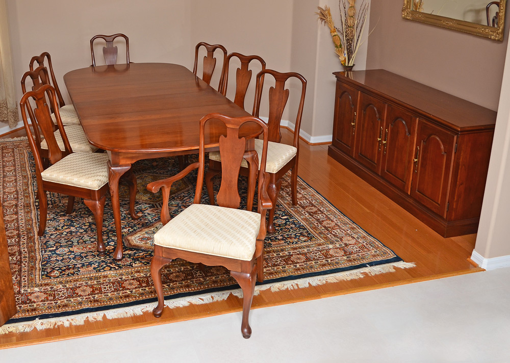 Appraisal: MAHOGANY DINING TABLE SIDEBOARD AND CHAIRS Top with rounded corners