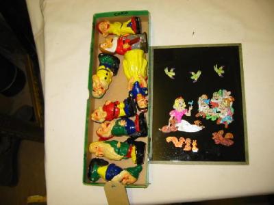 Appraisal: A painted plaster set Snow White and The Seven Dwarfs