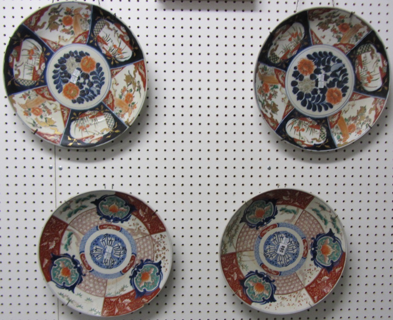 Appraisal: Two pairs of Japanese Imari chargers Meiji period typically painted