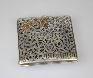 Appraisal: A Russian zol cigarette case with niello decoration inscribed 'kavkaz'