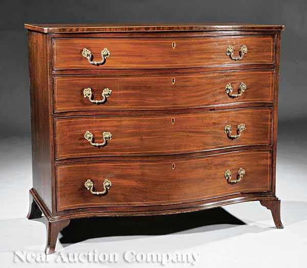 Appraisal: A George III Inlaid Mahogany Serpentine Chest of Drawers fitted