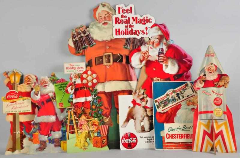 Appraisal: Lot of Coca-Cola Santa Claus Easel Back Pieces Condition Very