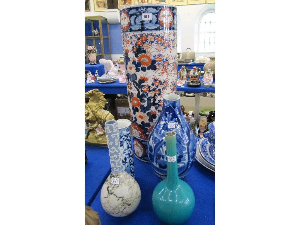 Appraisal: Lot comprising an Imari umbrella stand and four oriental vases