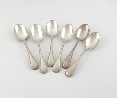 Appraisal: An Edwardian set of six bead pattern dessert spoons by