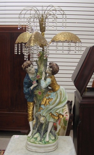 Appraisal: AN ITALIAN POTTERY FIGURAL TABLE LAMP Hand painted a young