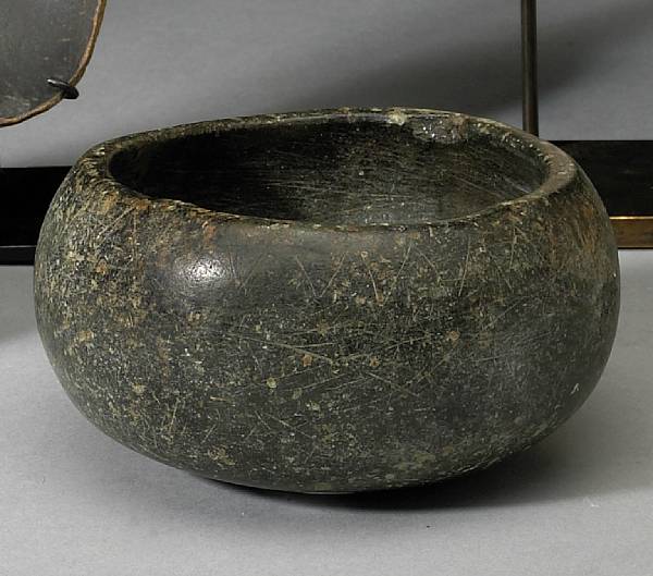 Appraisal: A Southern California stone bowl The low vessel with faint