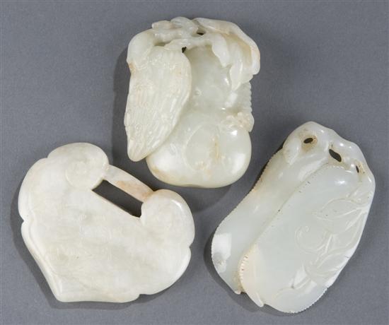 Appraisal: Group of three carved jade pendants th century Eggplant Double