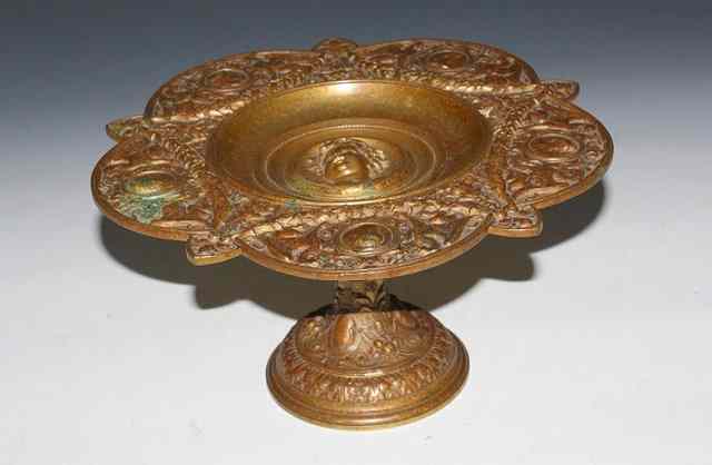 Appraisal: A TH CENTURY EMBOSSED METAL TAZZA with classical figure decoration