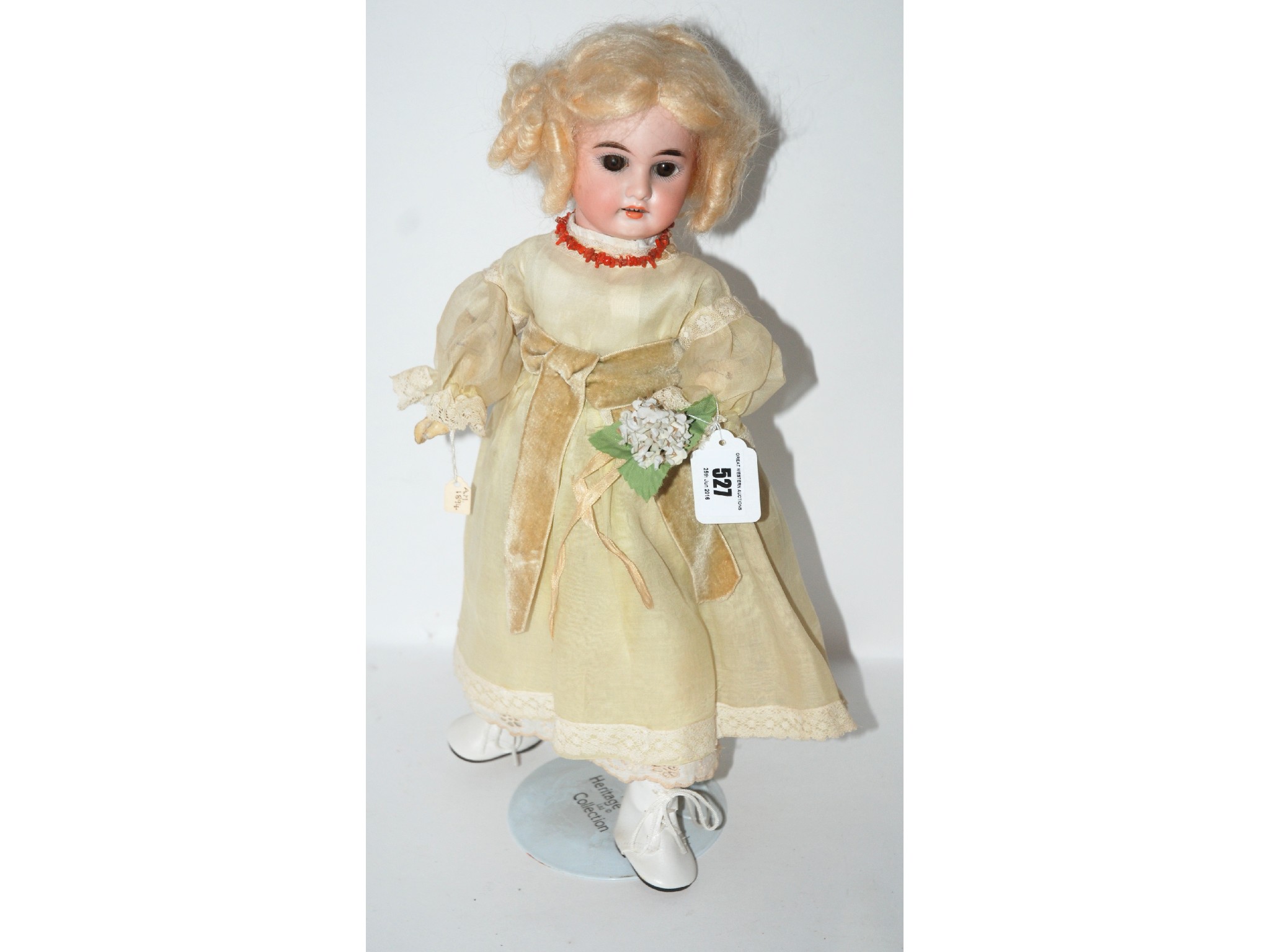 Appraisal: An Armand Marseille bisque-headed doll open and close brown eyes