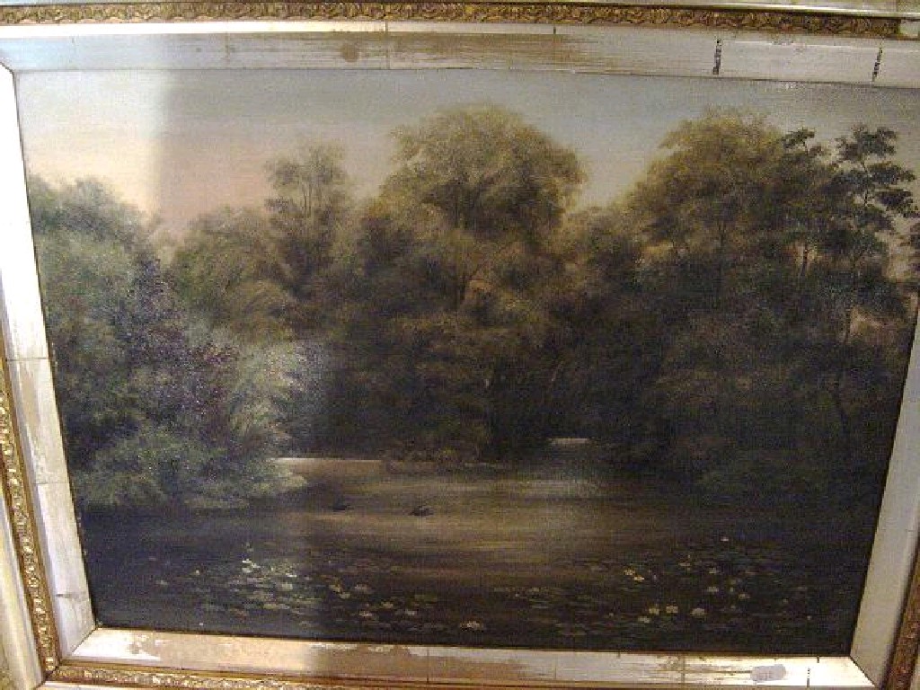 Appraisal: A th century oil painting on canvas of a lake