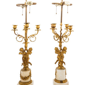 Appraisal: A Pair of French Gilt Bronze and Marble Candelabra Mounted