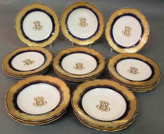 Appraisal: Ten gilt and blue service plates and nine bowls all