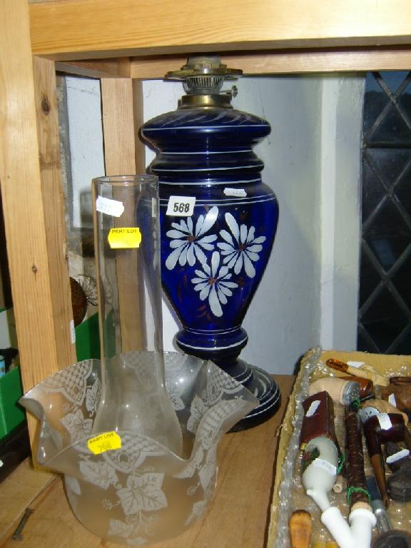 Appraisal: A late th century blue glass oil lamp base with