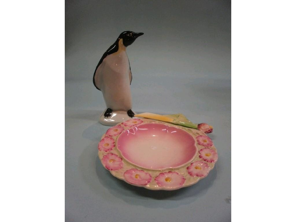 Appraisal: A Poole pottery penguin and a Beswick butter dish with