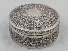 Appraisal: A white metal tests silver circular box probably Indian approx