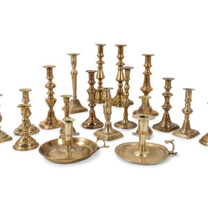 Appraisal: A Large Group of English Brass Candlesticks and Chambersticks includes