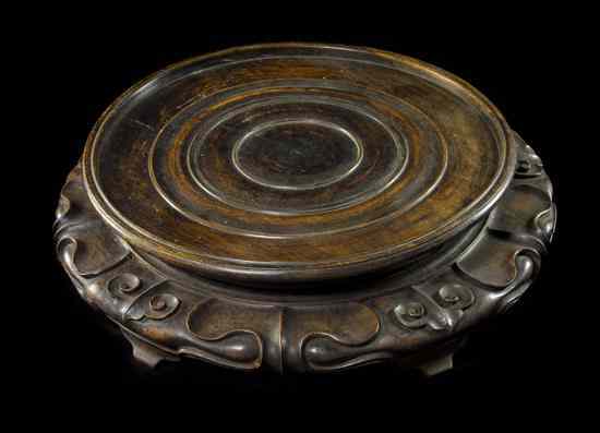 Appraisal: A Carved Hardwood Chinese Stand of circular form with pierce