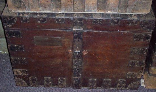 Appraisal: A metal bound silver chest with twin-handles to the sides