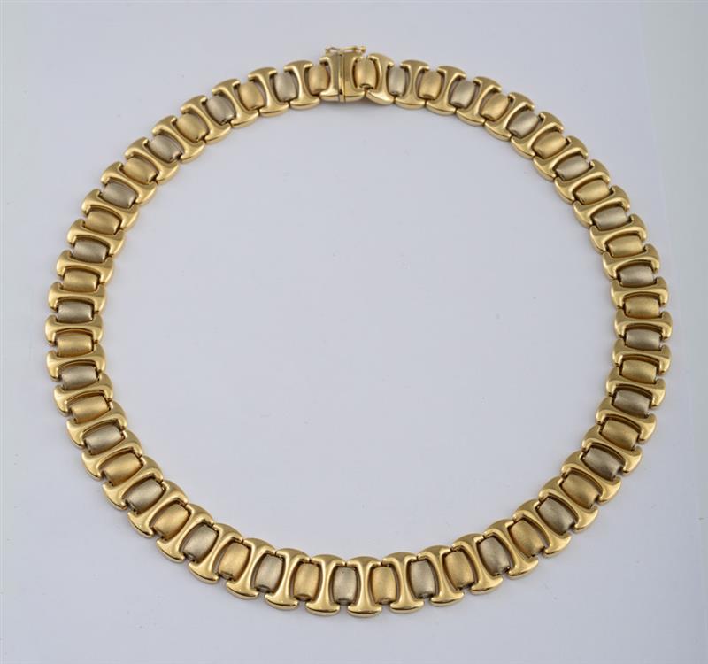 Appraisal: TWO GOLD NECKLACES One two-tone k brushed gold Egyptian style