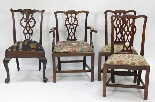 Appraisal: A collection of three George III mahogany dining chairs and