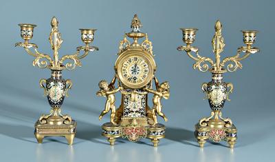 Appraisal: Enameled bronze dor garniture clock with pedestal flanked by cupid