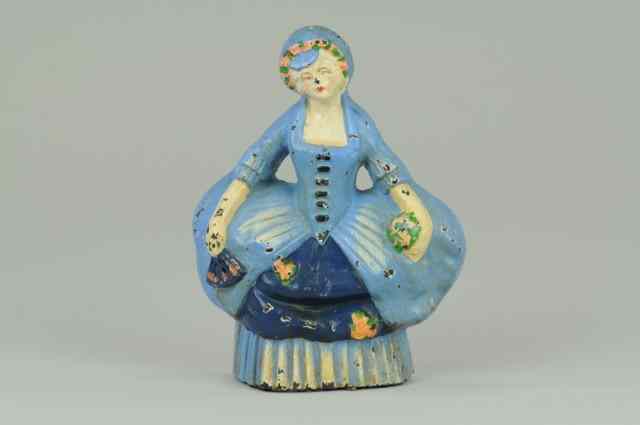 Appraisal: WOMAN IN BLUE HOOP SKIRT DOORSTOP '' '' on reverse