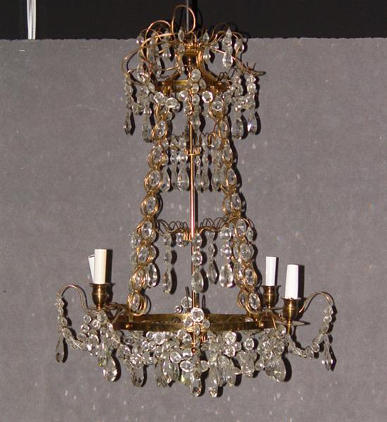 Appraisal: Brass Crystal Swedish Chandelier Early th Century Four electrified lights