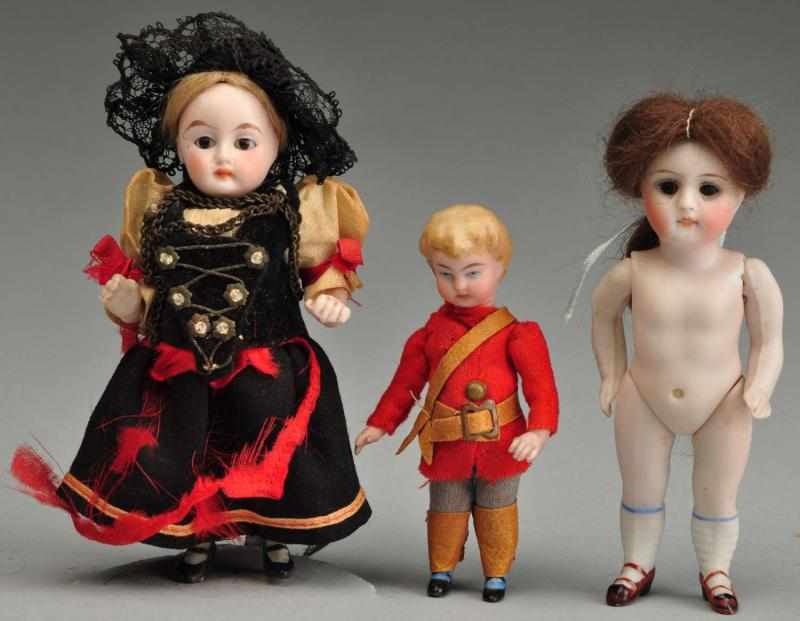 Appraisal: Lot of German All-Bisque Dolls Description Kestner girl with inset