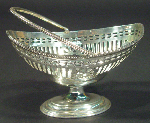 Appraisal: Silver boat shaped pedestal bonbon dish with pierced and chased