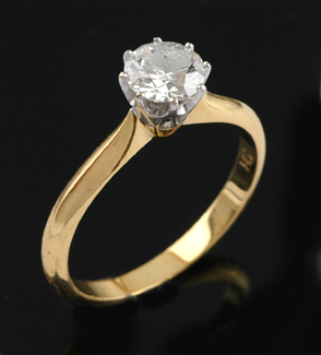 Appraisal: A diamond solitaire ring The round brilliant cut diamond weighing