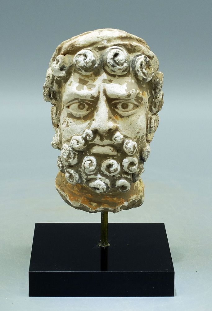 Appraisal: Gandharan Stucco Head - Indus Valley A beautiful Gandharan stucco