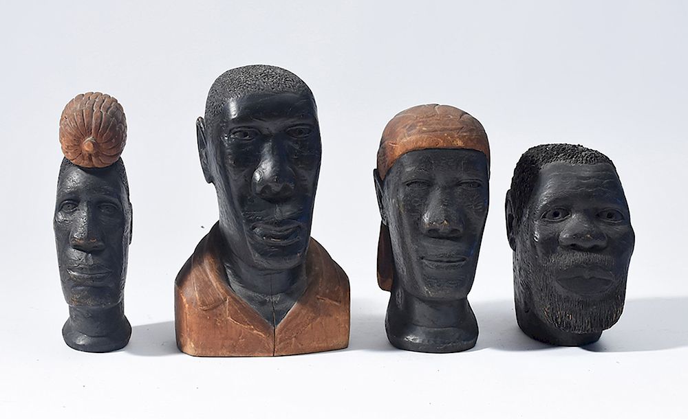 Appraisal: Grouping of four Haitian male portrait bust wood carvings Grouping