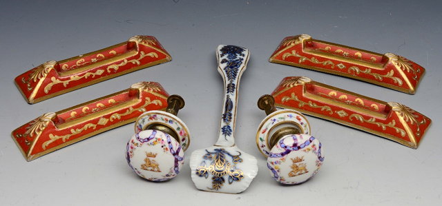 Appraisal: A SET OF FOUR STAFFORDSHIRE RED AND GILT RECTANGULAR KNIFE