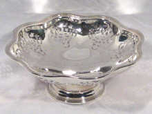 Appraisal: A round silver bowl with pierced decoration on a circular