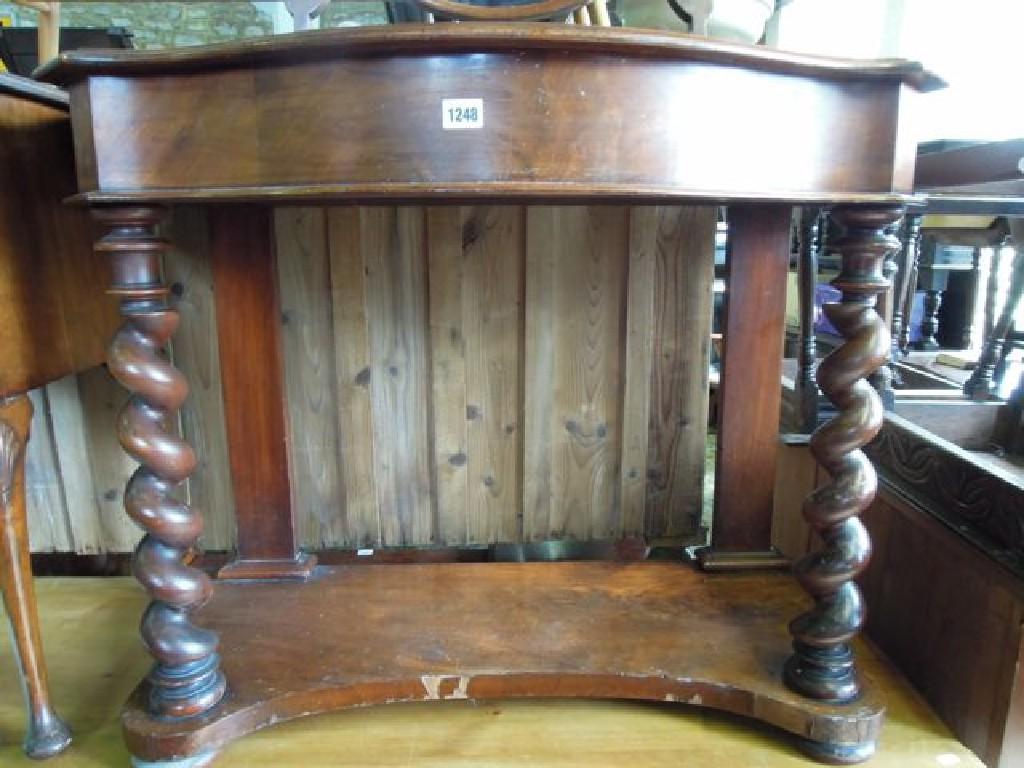 Appraisal: A Victorian mahogany Duchess washstand with shaped and moulded outline