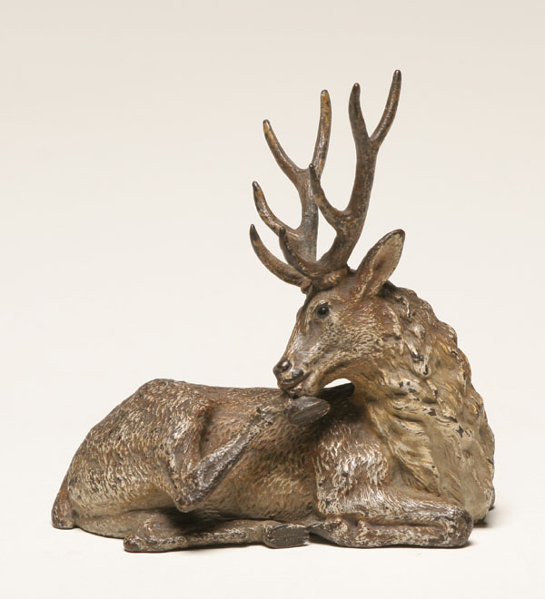 Appraisal: Vienna bronze figure of recumbent deer Style numbers on base