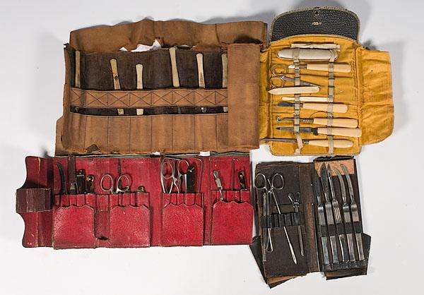 Appraisal: GROUP OF CASED MEDICAL INSTRUMENTS four leather cases containing instruments