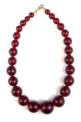 Appraisal: GRADUATED STRAND NECKLACE OF CHERRY AMBER BEADS '' long the