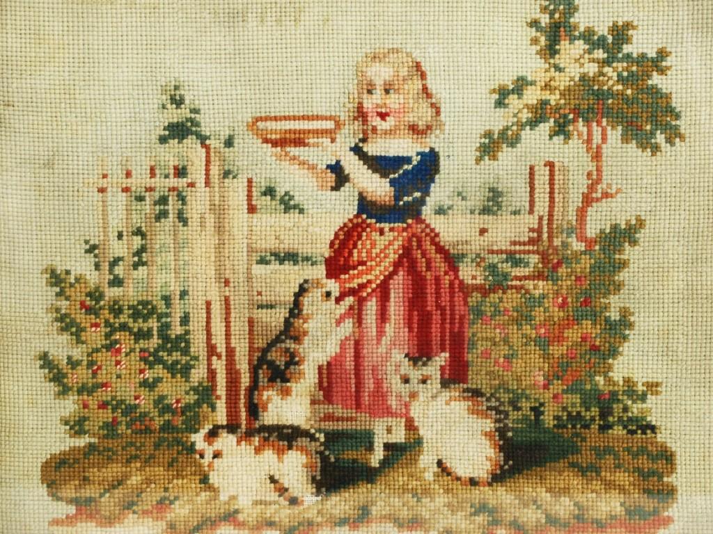 Appraisal: NINETEENTH CENTURY WOOLWORK PICTURE depicting a girl and two cats